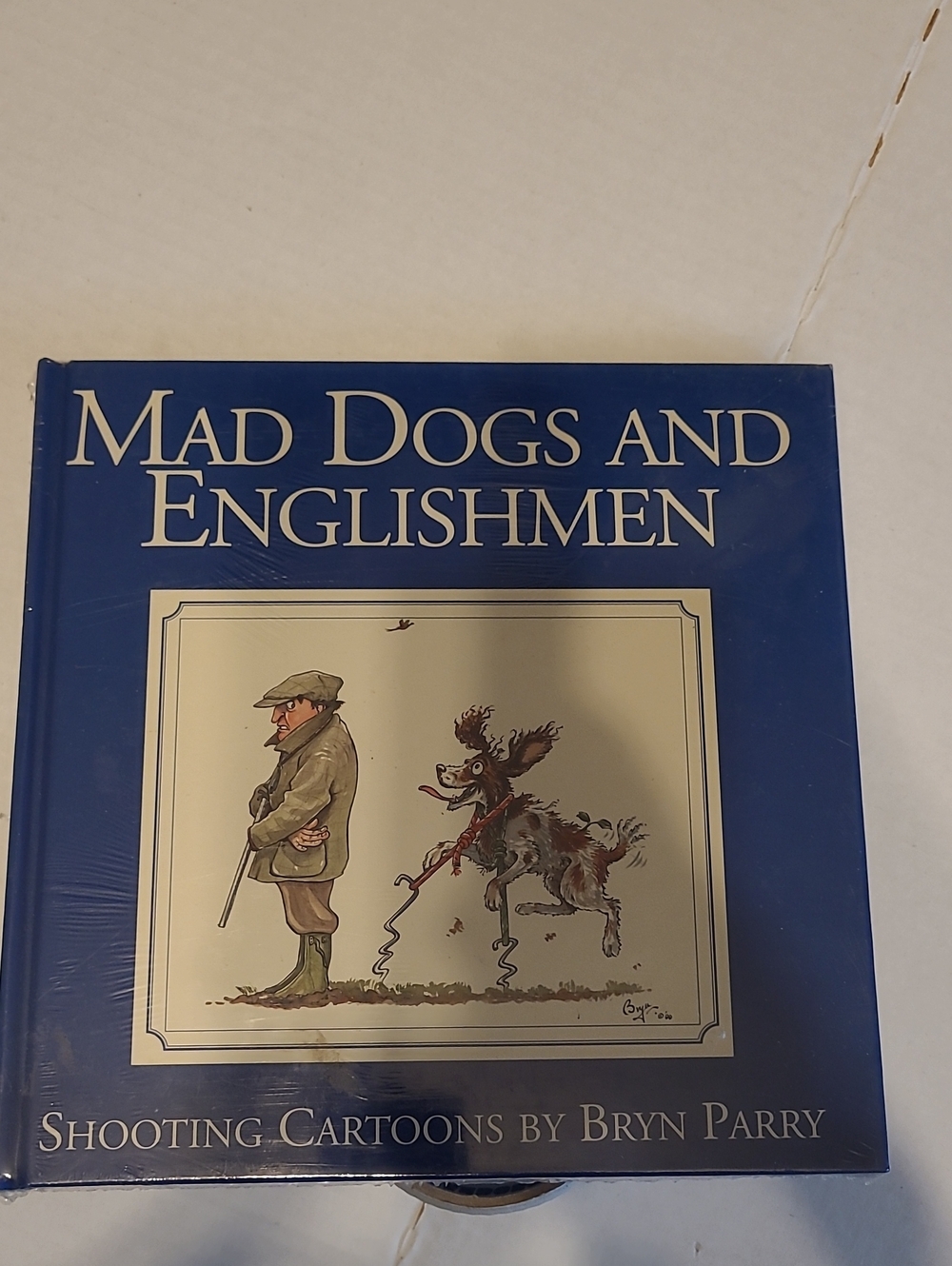 Mad Dogs and Englishmen - Blue Hardcover Book BRAND NEW